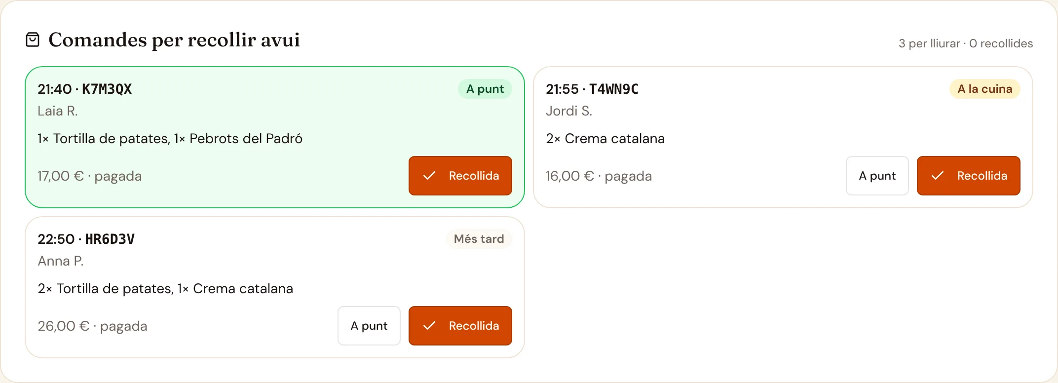 Les comandes per recollir d'avui al taulell del restaurant de demostració